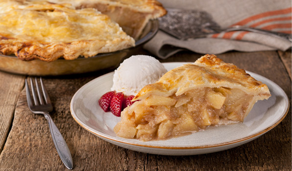 in the kitchen with stefano faita deep dish apple pie slice on a plate served with vanilla ice cream and strawberries