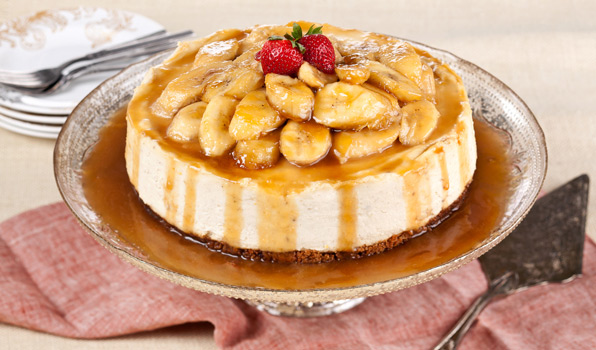 in the kitchen with banana bourbon cheesecake on a dish