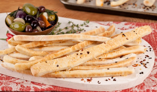 in the kitchen with stefano faita basic breadsticks served on a white plate with a side of assorted olives