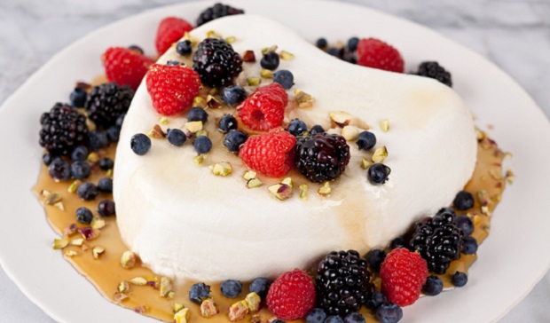 in the kitchen with stefano faita Coeur à la Crème served with honey and mixed berries on a plate