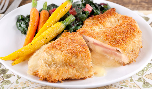 in the kitchen with stefano faita chicken cordon bleu served with vegetables on the side