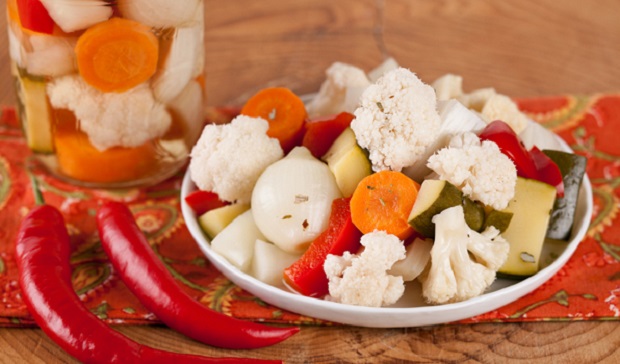 in the kitchen with stefano faita giardiniera served on a white dish with red chili peppers on the side