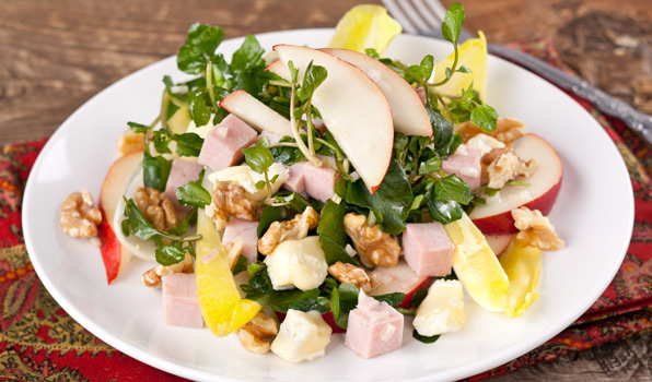 in the kitchen with stefano faita ham and endive salad served on a white dish