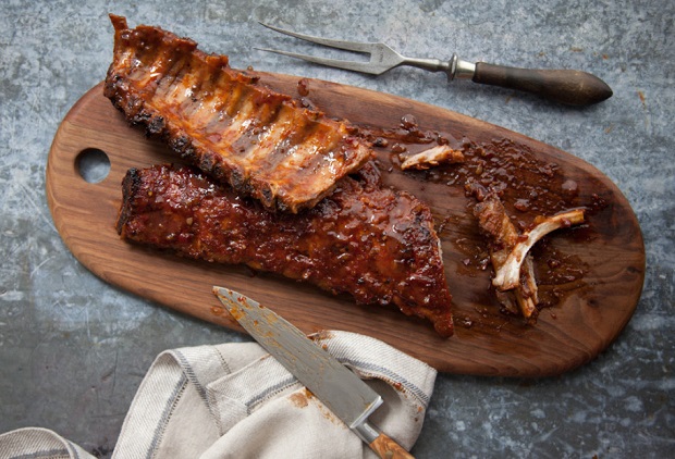 pati's mexican table honey chipotle ribs served on wood cutting board