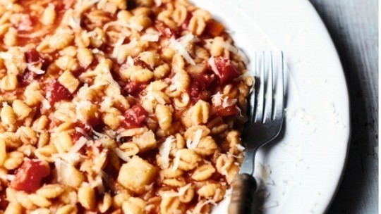 Pasta shells with guaniciale, potatoes and tomatoes