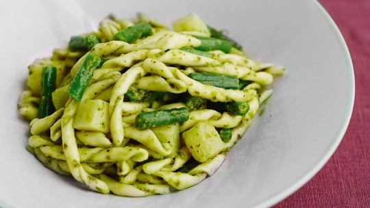 gino's italian escape pasta with pesto, green beans and potatoes served in bowl