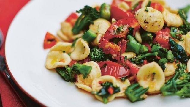 gino's italian escape orecchiette with broccoli and tomatoes served on plate