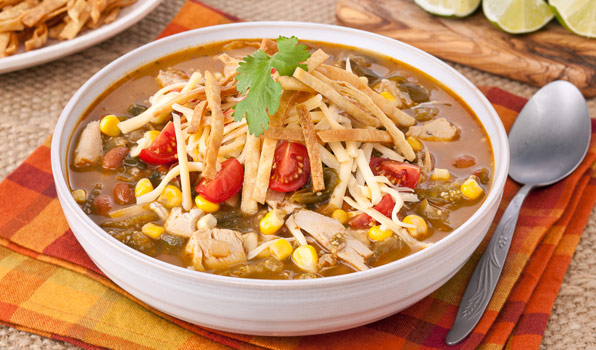 in the kitchen with stefano faita mexican chicken and bean stew with tortilla chips and corn served in a bowl