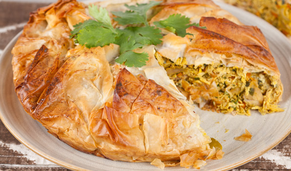 in the kitchen with stefano faita moroccan chicken pie on a dish garnished with parsley