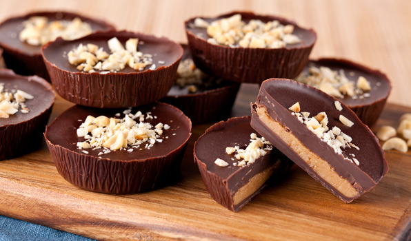 in the kitchen with stefano faita chocolate peanut butter cups on a wooden cutting board