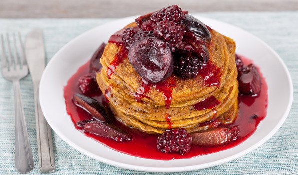 in the kitchen with stefano faita ginger pumpkin pancakes on a plate with plum and blackberry toppings
