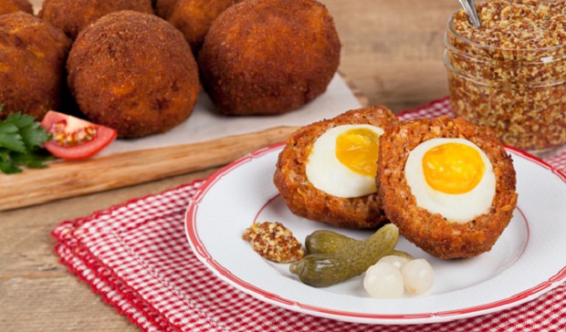 in the kitchen with stefano faita scotch eggs on a plate with grainy mustard and pickles