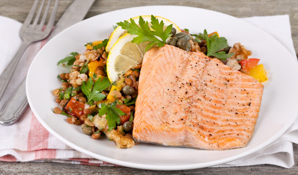 in the kitchen with stefano faita rainbow trout with lentil salad served on a plate