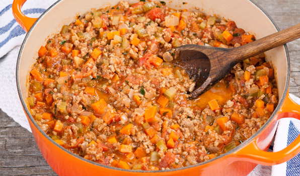 in the kitchen with stefano faita veal bolognese sauce in a pot and wooden spoon