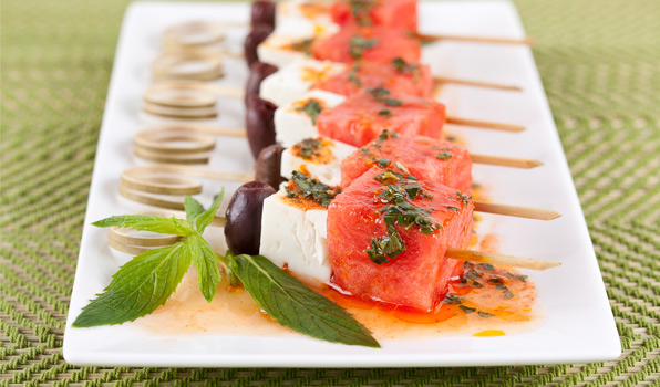 in the kitchen with stefano faita watermelon and feta salad served with dressing drizzled on top